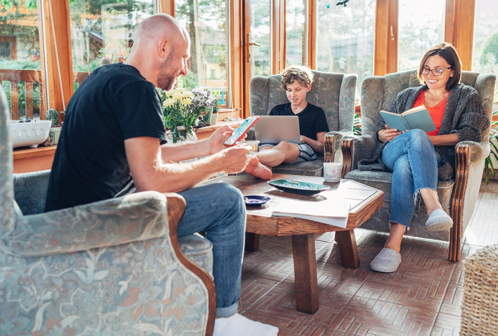 Family enjoying a custom screen room or sunroom